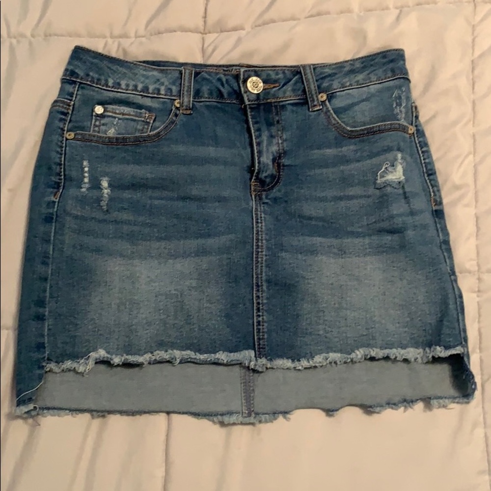 Blue jean skirt with some rips
